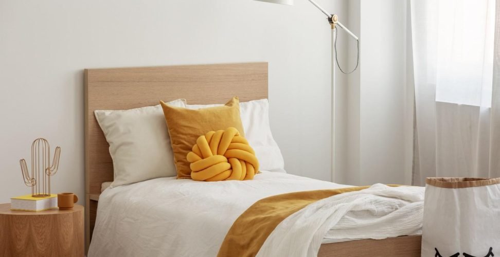 tall-industrial-lamp-over-yellow-pillows-and-blank-2024-10-20-01-41-34-utc (1)